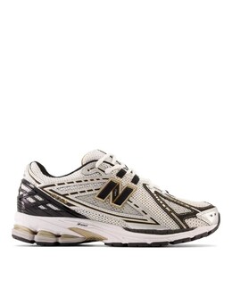 Кроссовки New Balance 1906 серебристого и золотого цвета 132730661 | schwarz