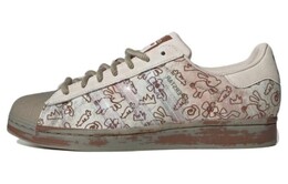 Кроссовки Superstar Melting Sadness X Adidas 'Allover Graphics - Clear Brown' h06343
