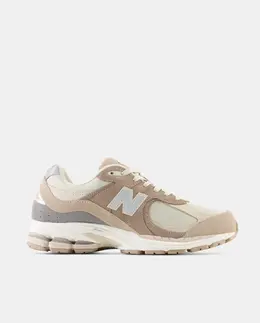 Повседневные кроссовки для женщин 2002R New Balance, светло-коричневый a53618669 | marrón suave